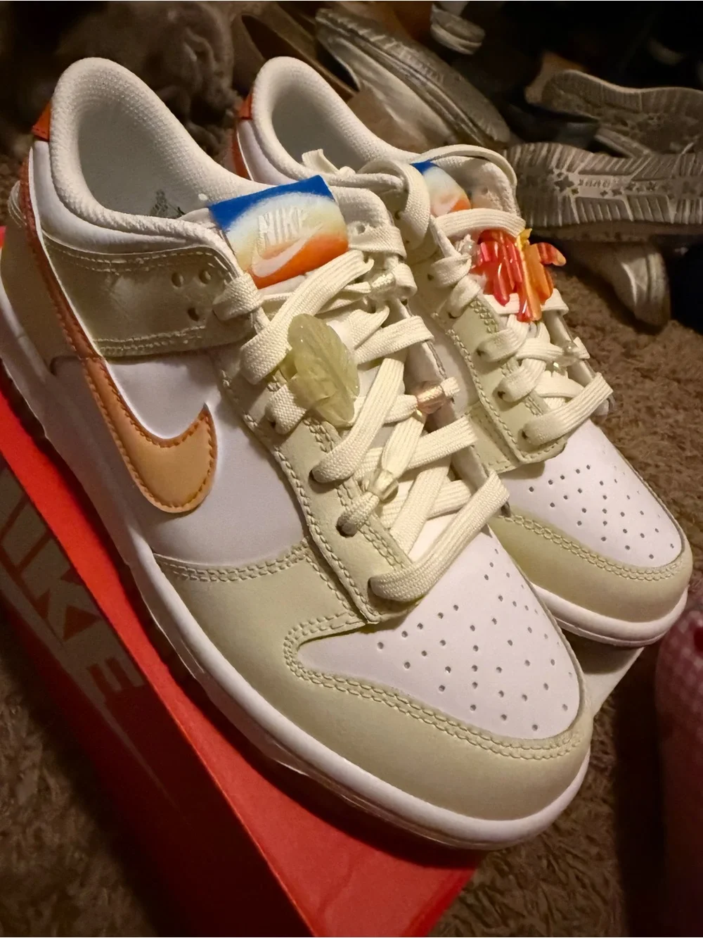 Nike Kids Low-Top Sneakers in Cream with Orange Swoosh
